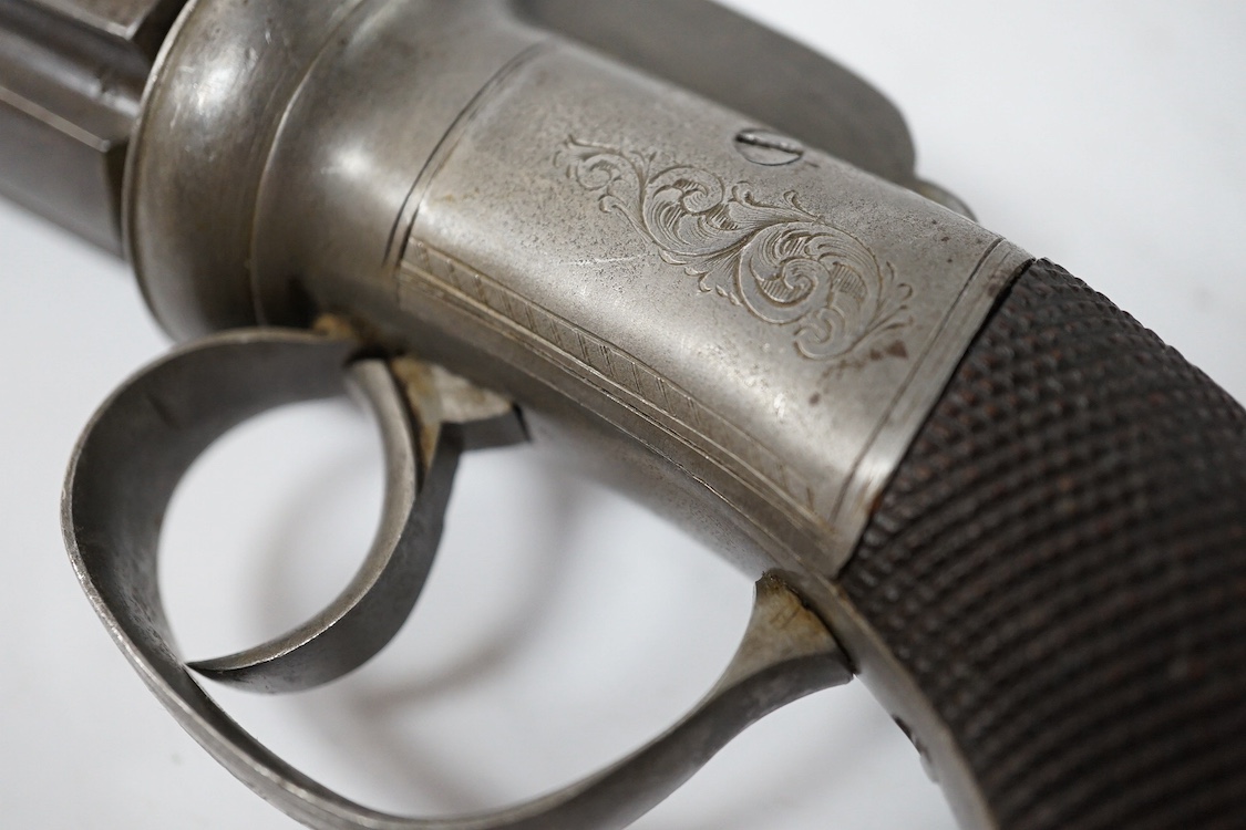 A six shot 120 bore self cocking percussion pepper box revolver, with fluted barrels, Birmingham proofed, round scroll engraved frame, and two-piece chequered walnut grips. Condition - fair to good, acid cleaned